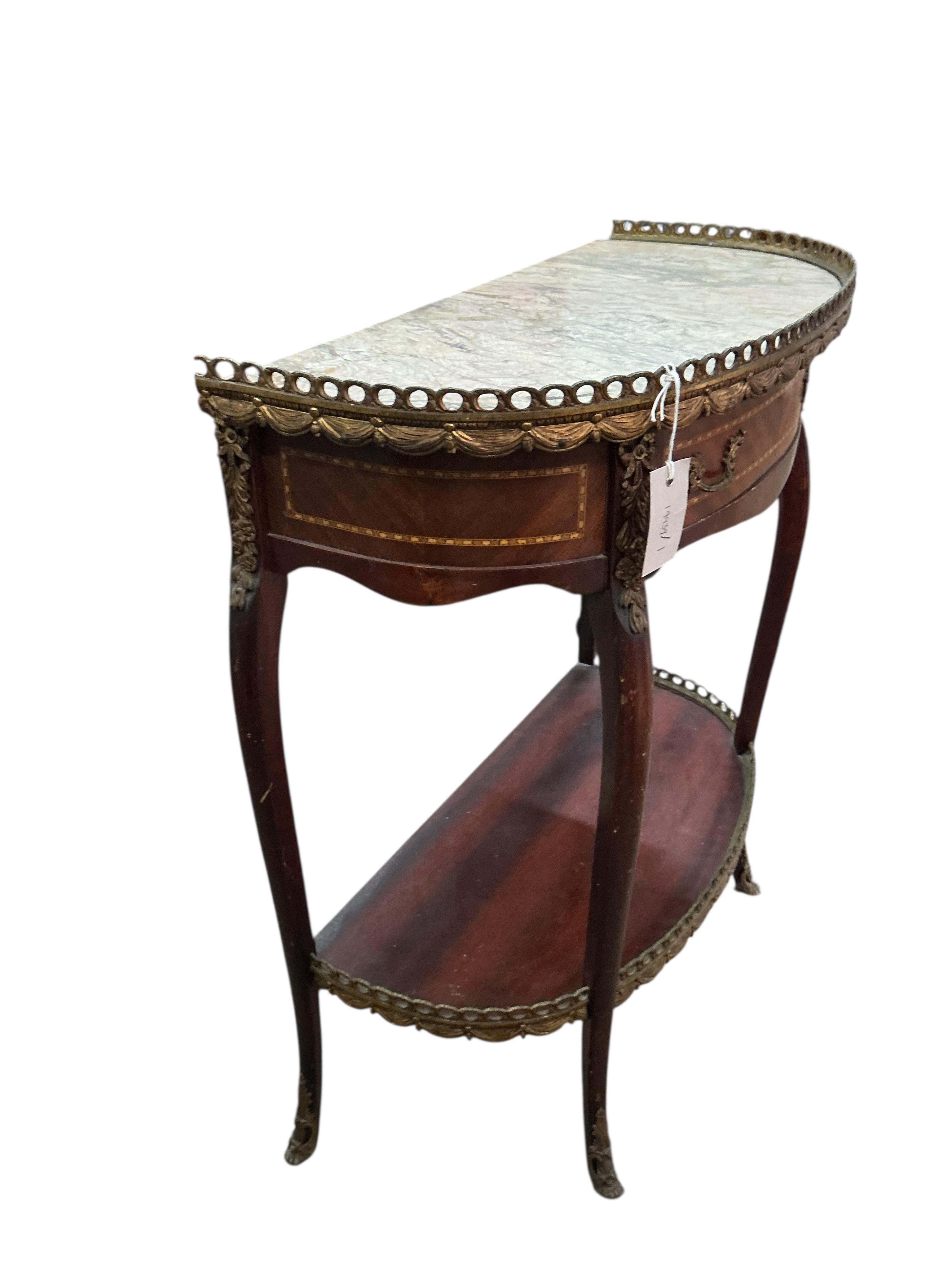 A Louis XVI style D shape marble top gilt metal mounted two tier table, width 64cm, depth 31cm, height 73cm